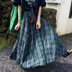 レトロな百合の格子縞のしわの大きいスカートの女性の秋冬の新型の高い腰の緩みのデザイン感の長いタイプのa字のスカート