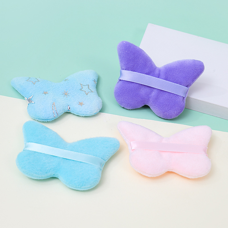 La borla de flocado corto en forma de mariposa transfronteriza no come polvo esponja de terciopelo de pie polvo suelto maquillaje maquillaje maquillaje algodón fábrica personalizado al por mayor