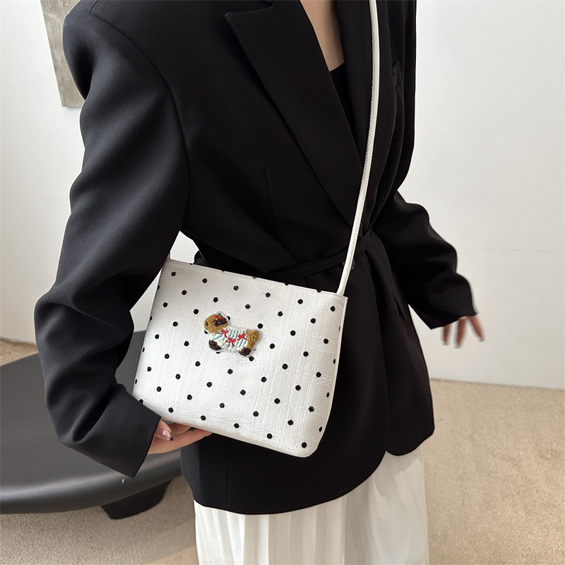 Bolsa de lona popular de este año para mujeres 2024 nuevo bolso de balde de verano de gran capacidad de alta calidad sensación de mochila de viaje