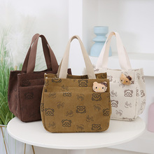 新款大容量手提包女时尚灯芯绒宝妈外出学生饭盒包简约上班布包潮