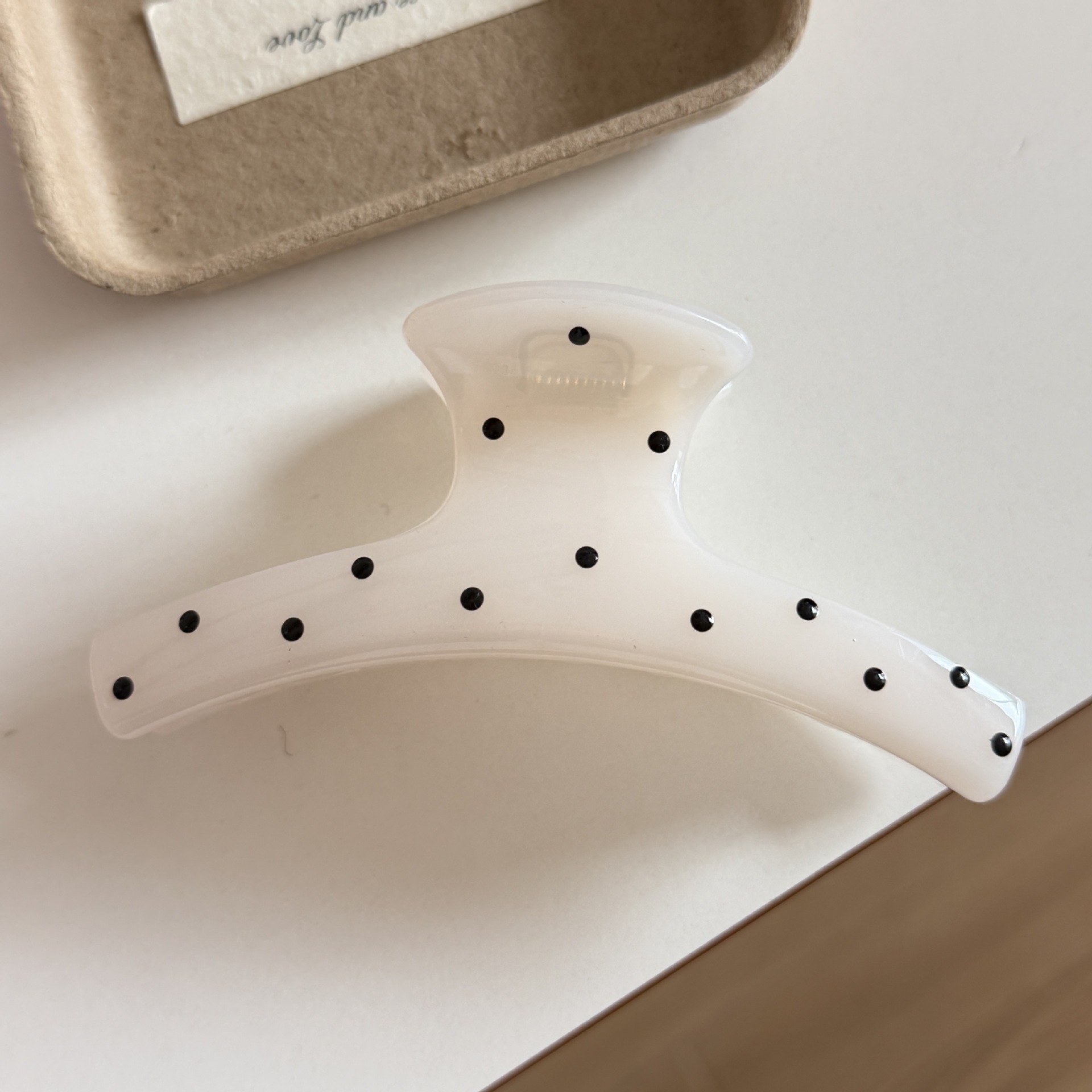 Jelly white polka dot clothes hanger
