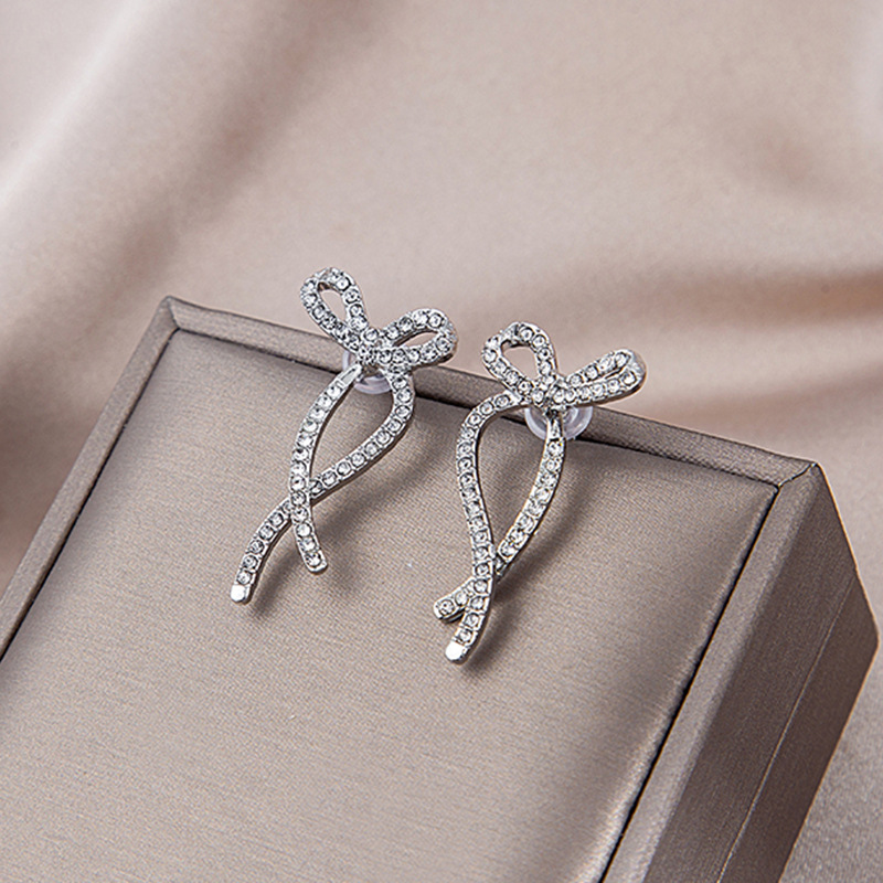 Front Rear Dual-wear Cross Earrings Irregular Diamond-embedded Bow Stud Earrings display picture 3