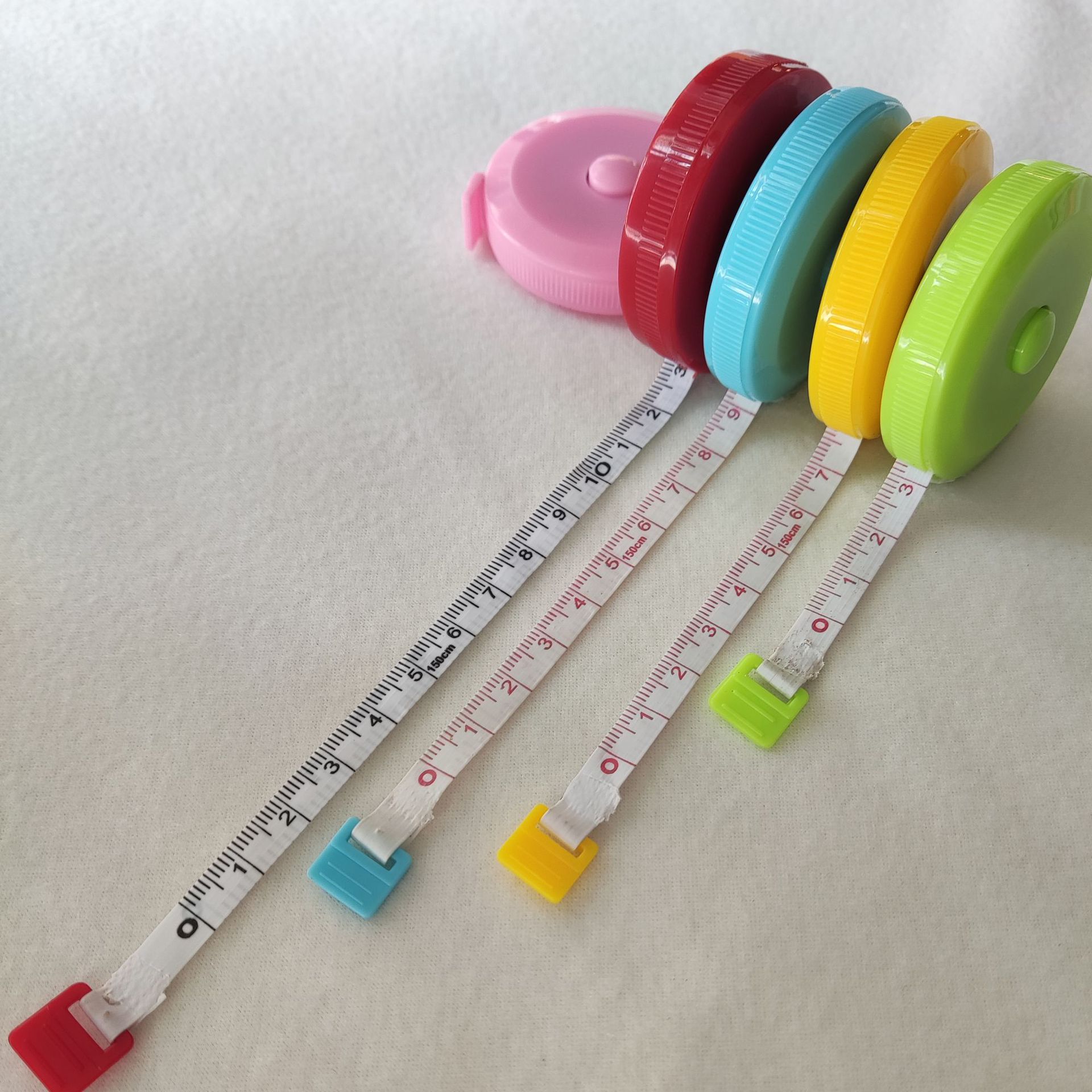 Cinta métrica de Color 1,5 m Mini cinta métrica retráctil redonda en stock publicidad LOGO regla de regalo regla de tres circunferencia Regla suave