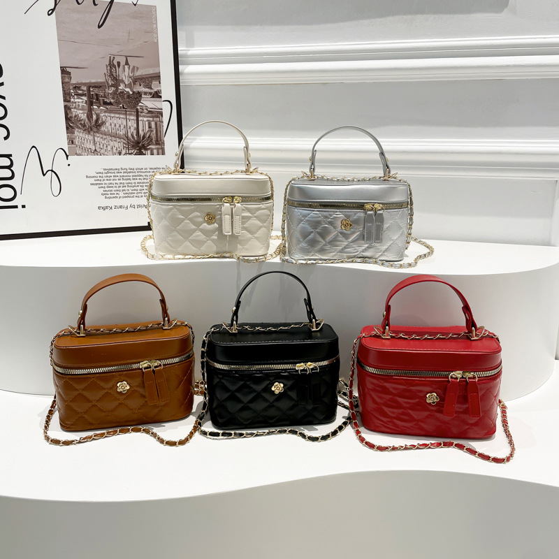 Bolso popular de este año bolso de mano mujer 2024 invierno nuevo estilo simple chaîne de diamante mochila bolso de cubo