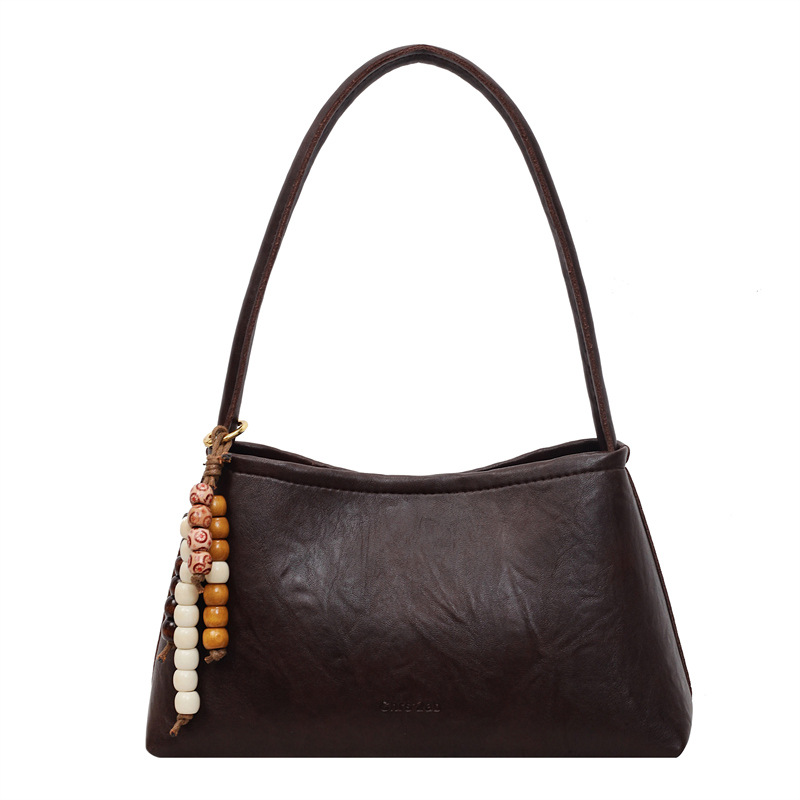 Bolsas transfronterizas para mujeres 2025, otoño y invierno, nuevo bolso coreano, bolso de brazo retro, bolso de hombro simple de moda para mujeres.