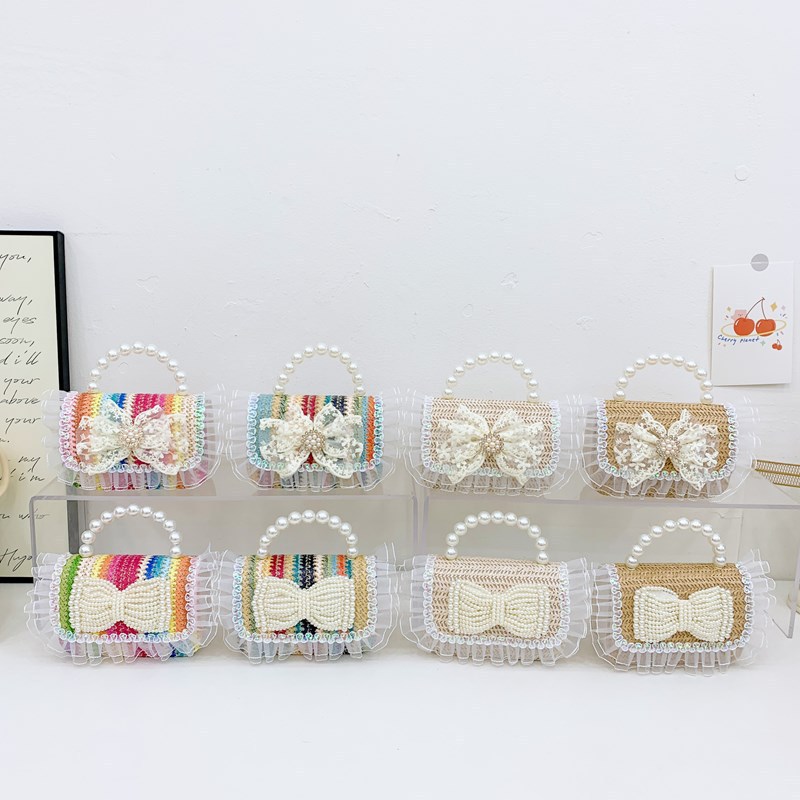 2025 nuevo regalo para niñas para niñas jardín de infantes Día de los niños arco de perla tela de paja bolso de hombro