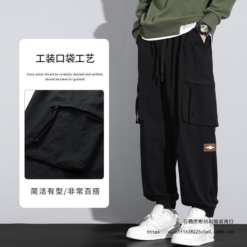 Nuevos pantalones de trabajo de alta calidad de primavera para hombres, moda multibolsillos con tendencia universal