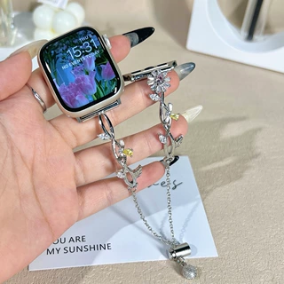 适用苹果AppleWatch表带轻奢带钻大方旋转钻石粉花伸缩链金属表带