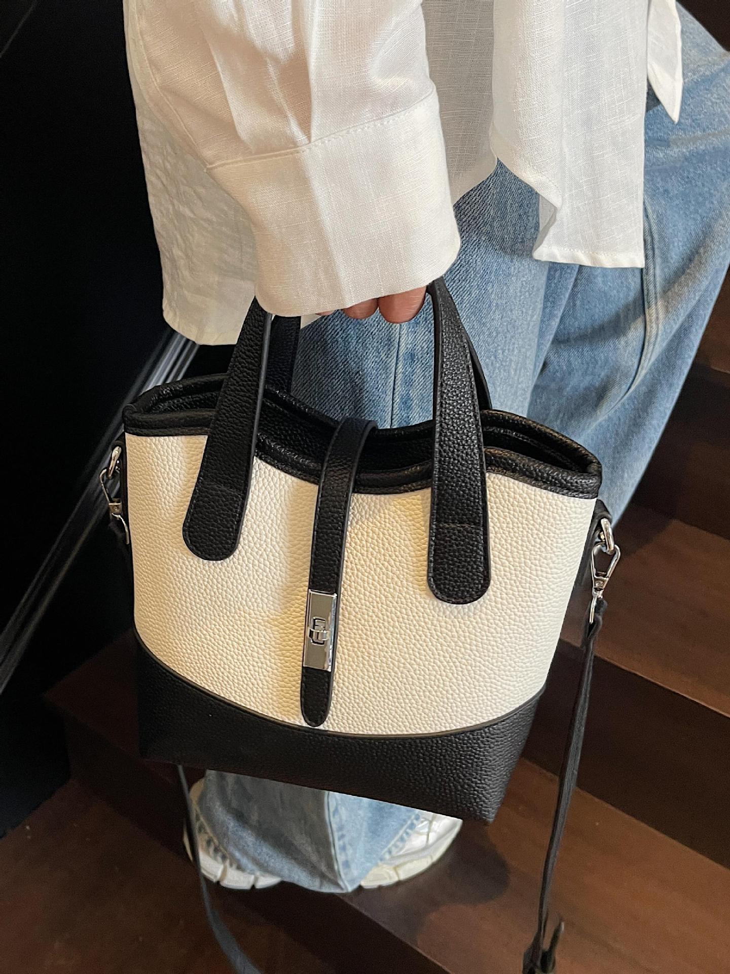 2025 nueva venta caliente transfronteriza bolso de cubo de mano moda femenina color de contraste fabricante de un solo hombro al por mayor bolso de mensajero sentido de alta gama