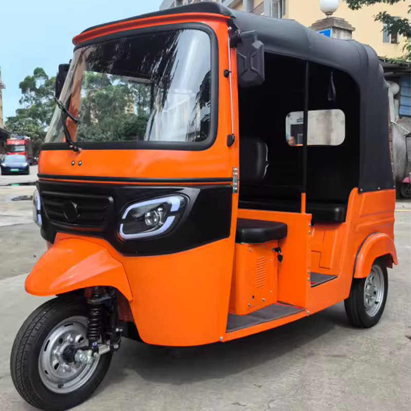 Tuk Tuk transfronterizo de pasajeros y carga de triciclo Tuk Tuk exportación de triciclo eléctrico de pasajeros con cabina