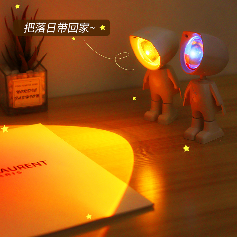 Robot sunset lamp astronaut sunset atmosphere photo fill light astronaut sunset colorful mini night light