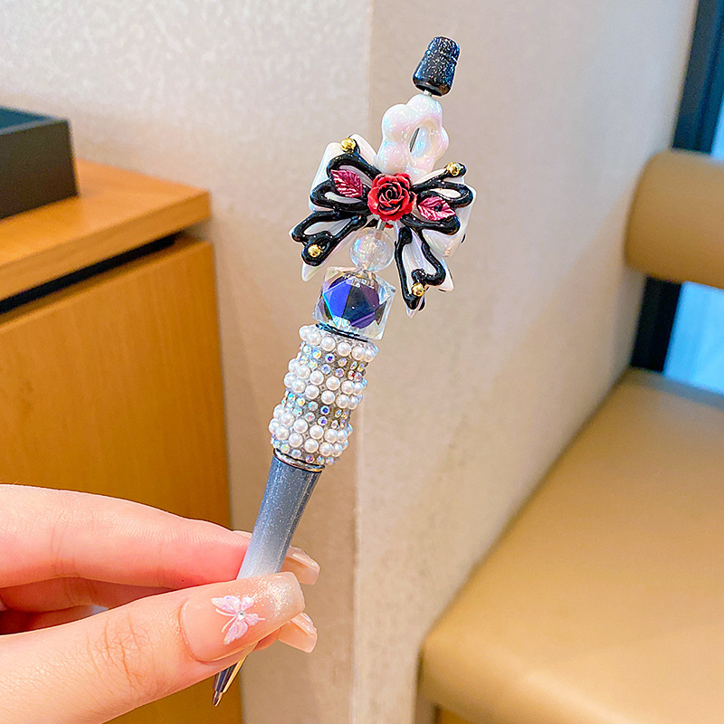 Bolígrafo negro muñeca dibujos animados DIY bolígrafo creativo diamante Snowflake princesa Elsa papelería infantil de color