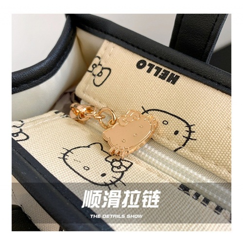 HelloKitty genuine new canvas portable toiletry bag cosmetic bag large capacity tote bag mommy bag women's bag