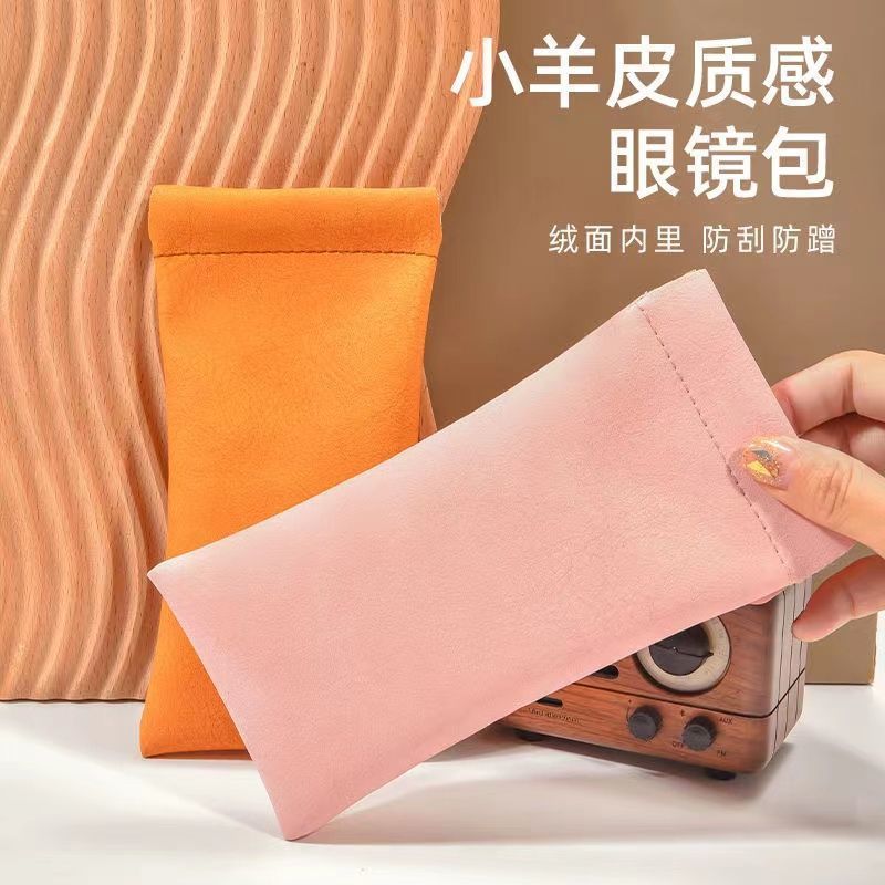 革のメガネの袋の女性の携帯用メガネの収納袋の弾片の口は自動的に閉じます。|undefined