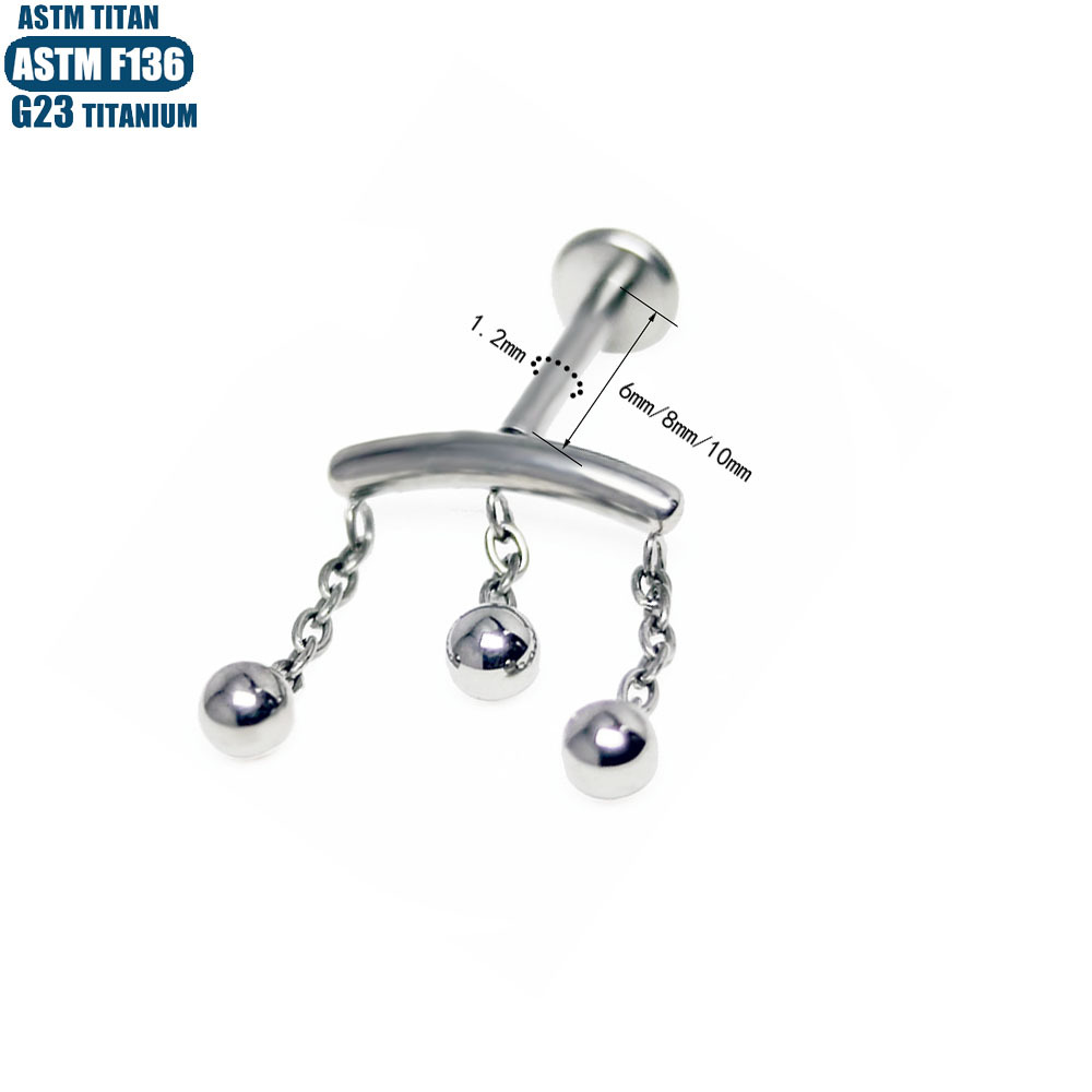 Silver pointed spike labret stud material detail