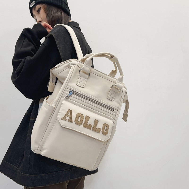 Universal capacious school bag for mother and baby