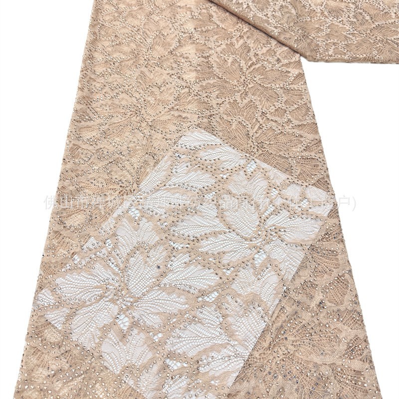 Nuevo hueco flor de encaje fondo tela de perforación caliente pesada cola de pez vestido de boda vestido de noche brindis tela spot