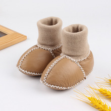 秋冬0-1岁婴儿学步鞋软底保暖透气羊皮毛一体婴儿鞋地板袜室内鞋6