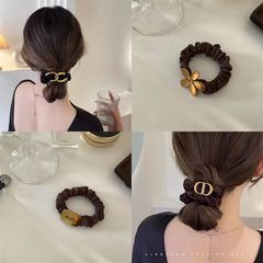 韓国の小香風金属の頭縄の黒色の気質の高級感の大腸のシュシュのシンプルな丸子の頭の皮の筋の高い顔の値
