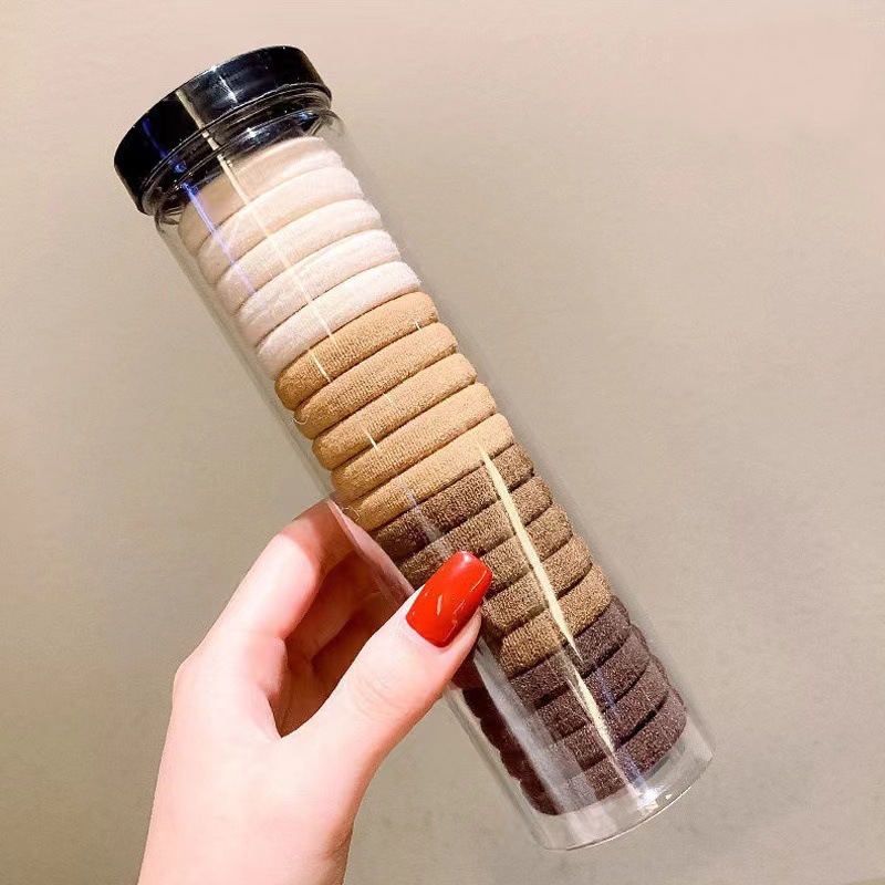 Bebés color caramelo de alta elasticidad pulgar anillo de cabello de niñas adornamiento de cabello de dopamina no daña banda de goma de cabello