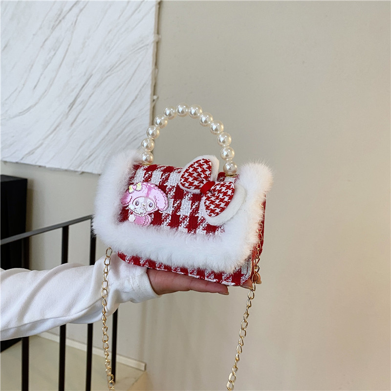 Mochila de niños estilo extranjero princesa perla de viento pequeño cambio bolso de hombro de niña encantadora