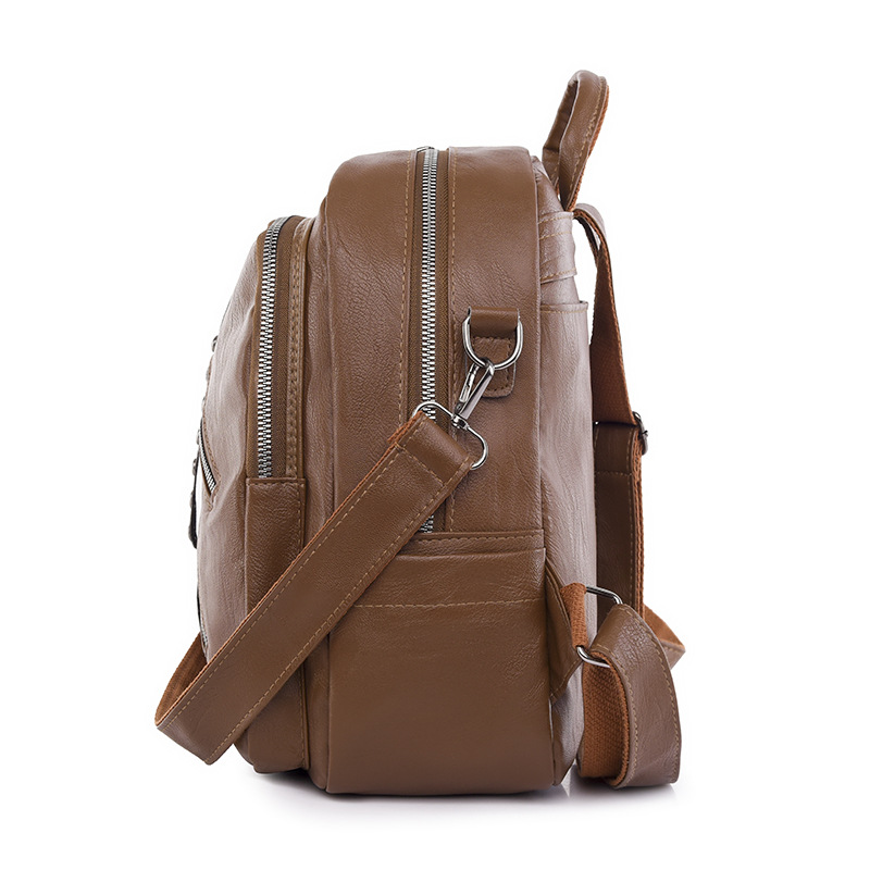 Nueva mochila de cuero suave para mujer casual del sudeste asiático moda remache retro mochila multifuncional de doble uso mochila escolar de moda