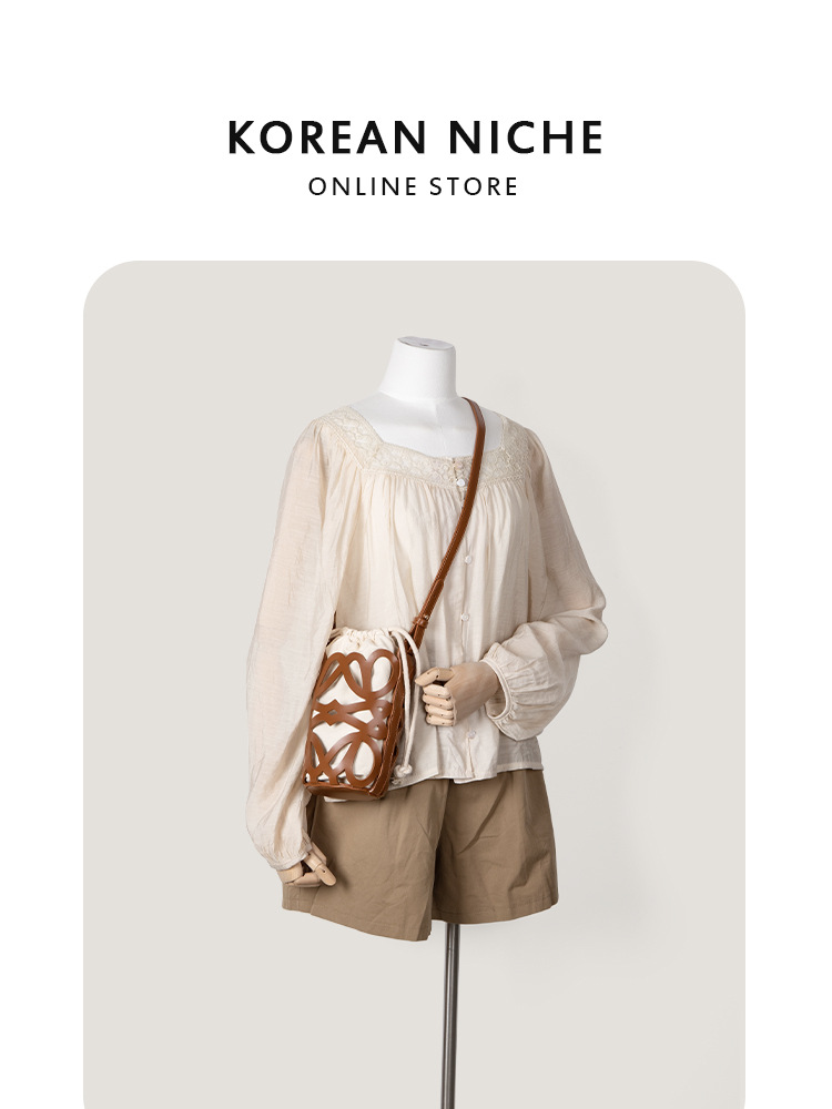 Nuevo bolso bandolera cilíndrico de lona con cordón y diseño coreano de nicho, para mujer, de alta gama, único y versátil.