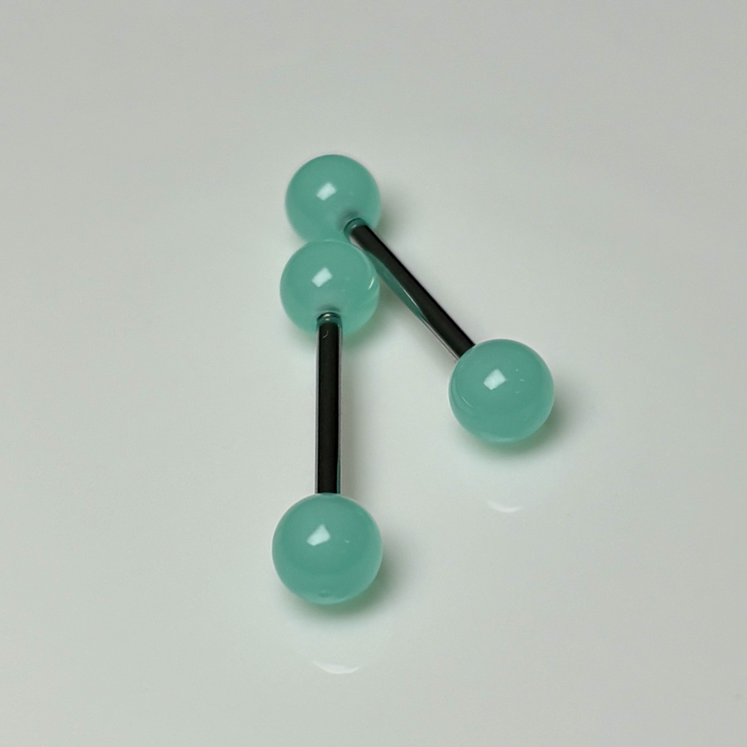 Silver pointed spike labret stud material detail