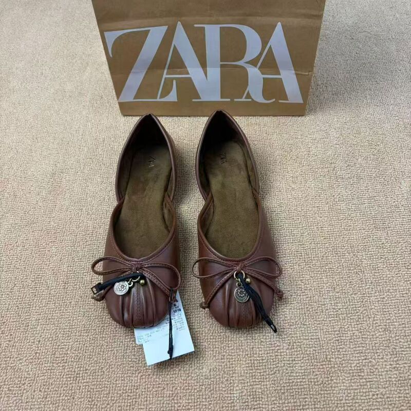 ZAKQ in-stock 2026 summer new collection: round-toe brown ballet flats with a bow detail and a hollowed-out design, Mary Jane style ZAKQ in-stock 2026 summer new collection: round-toe brown ballet flats with a bow detail and a hollowed-out design, Mary Jane style