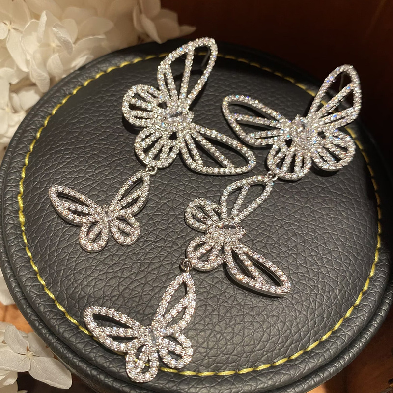 Asymmetric Butterfly Earrings Sweet Elegant Three-dimensional Super Fairy Temperament Lady Exaggerated Slimming Hollow Flower Earrings Asymmetric Butterfly Earrings Sweet Elegant Three-dimensional Super Fairy Temperament Lady Exaggerated Slimming Hollow Flower Earrings
