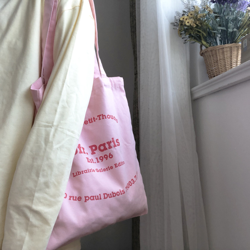 2021新款蜜桃粉帆布包ins大热简约字母包薄款棉布袋学生书包