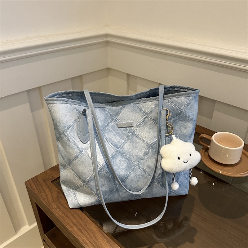 Casual retro bolso de gran capacidad para mujeres 2024 nueva moda moda bolso de hombro de tendencia de textura universal bolso de viaje
