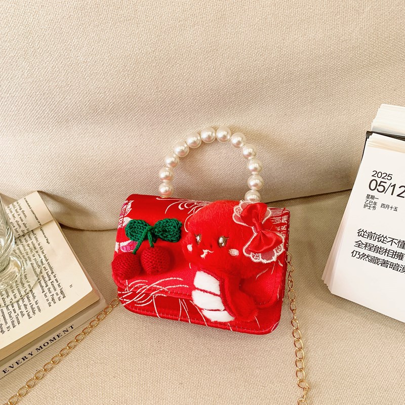 2025 rojo festivo bolso de Año Nuevo para niños estilo occidental perla bolso de niña hilo bordado bowknot bandolera para niños