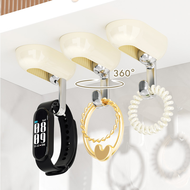 En stock gancho giratorio creativo 2023 gancho pegajoso fuerte detrás de la puerta de soporte de carga sin costuras adhesivo pasillo percha al por mayor