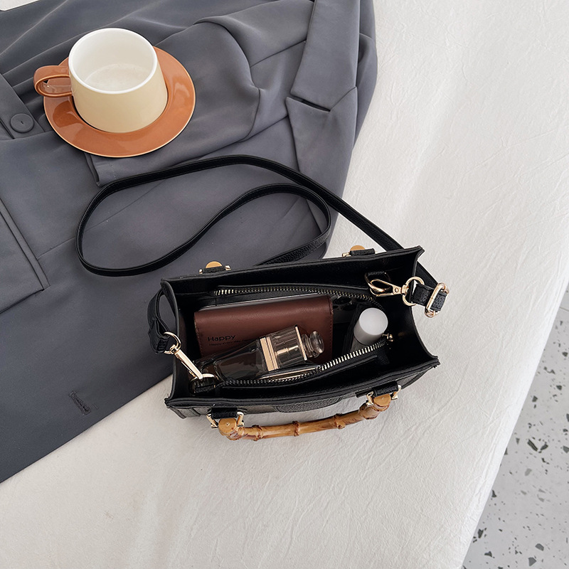 Europa y los Estados Unidos retro bolsos transfronterizos mujeres 2024 nueva moda simple bolsos de mano casuales cocodrilo mochila pequeña