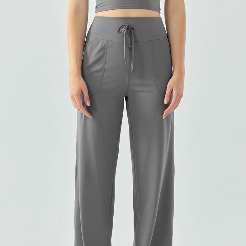 Pantalones deportivos de piernas largas desnudos sueltos respirables casuales pantalones deportivos de cintura alta, pantalones de calzado de calzado, pantalones de mujer