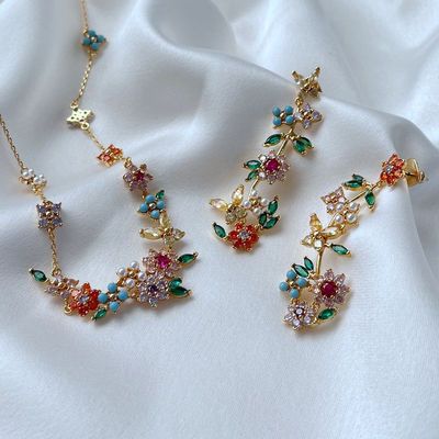 new pattern fashion Light extravagance commute A small minority Asymmetry design Super Flash zircon Set Flower butterfly Earrings Necklace