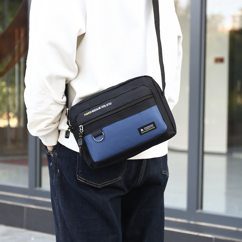 Bolso bandolera horizontal para hombre nuevo Bolso de hombro casual de tendencia transfronteriza Bolso de hombre de negocios de almacenamiento multicapa simple de moda
