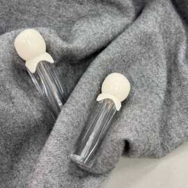创意融化造型唇釉管奶白滴落盖透明管身化妆品包材源头厂可印logo