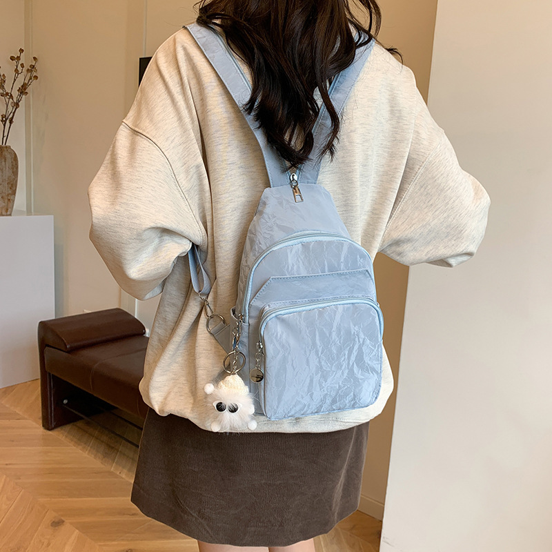 Nuevos productos de cuero suave pu doble uso bolso de pecho de moda de mujer impresión de tendencia nueva mochila china textura mochila pequeña