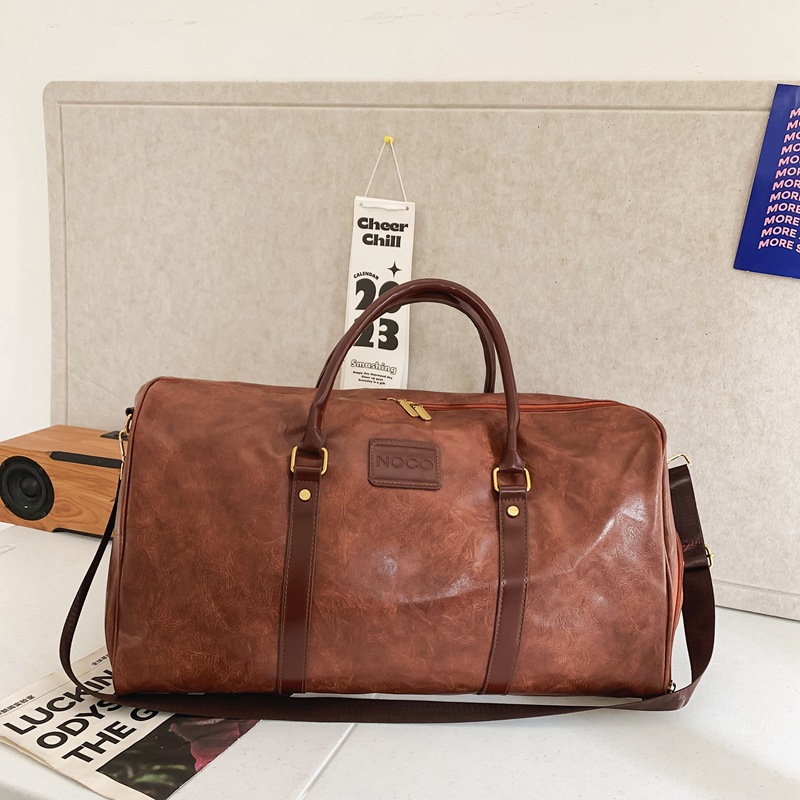 Bolsa de viaje de hombre transfronteriza de estilo europeo y americano, bolsa de maleta de gran capacidad, bolsa de fitness a prueba de salpicaduras.