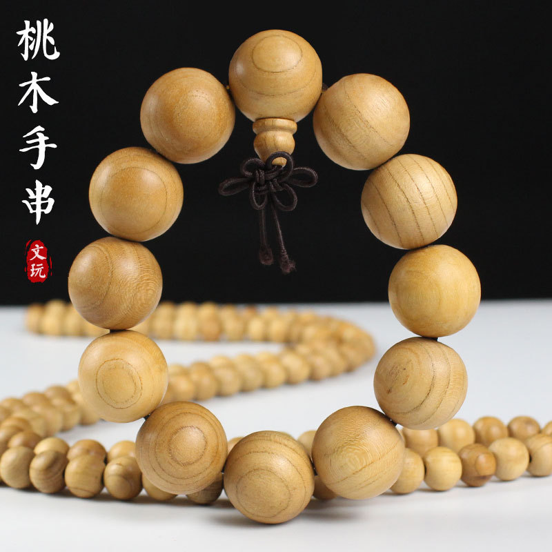 Factory wholesale peach wood bracelet 2.0 beads 108 beads bracelet men's and women's cultural play crafts studio welfare