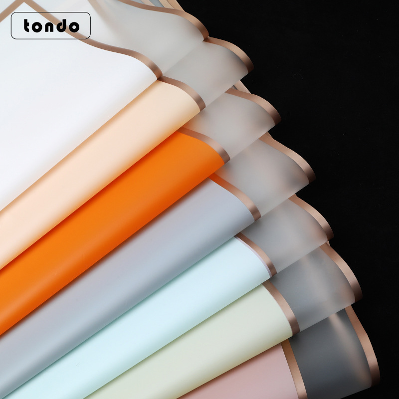 Papel de regalo semitransparente impermeable Tangde, serie Space Milan, con doble borde dorado, material de embalaje tipo película de gelatina.