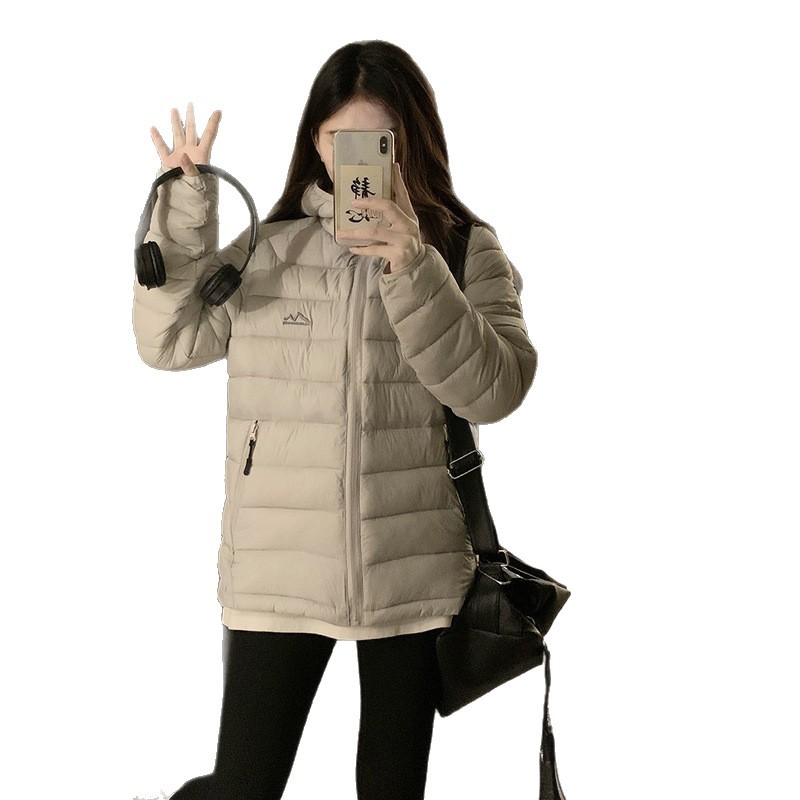 Invierno ligero encapuchado chaqueta de algodón para mujeres 2025 nuevo estilo coreano para vestir con abrigo de algodón caliente y grueso