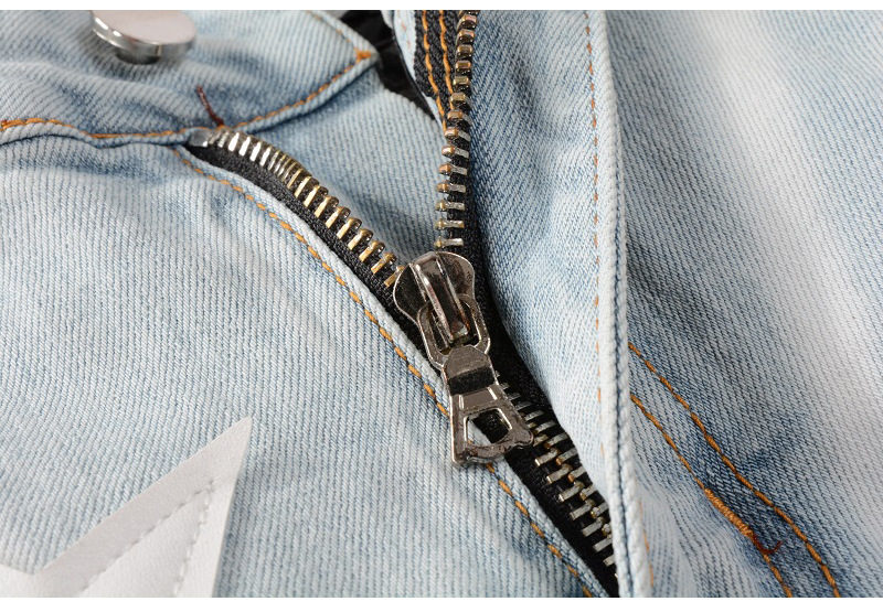 Jean homme slim fit élastique avec trous aux genoux et étoiles_voghion.com