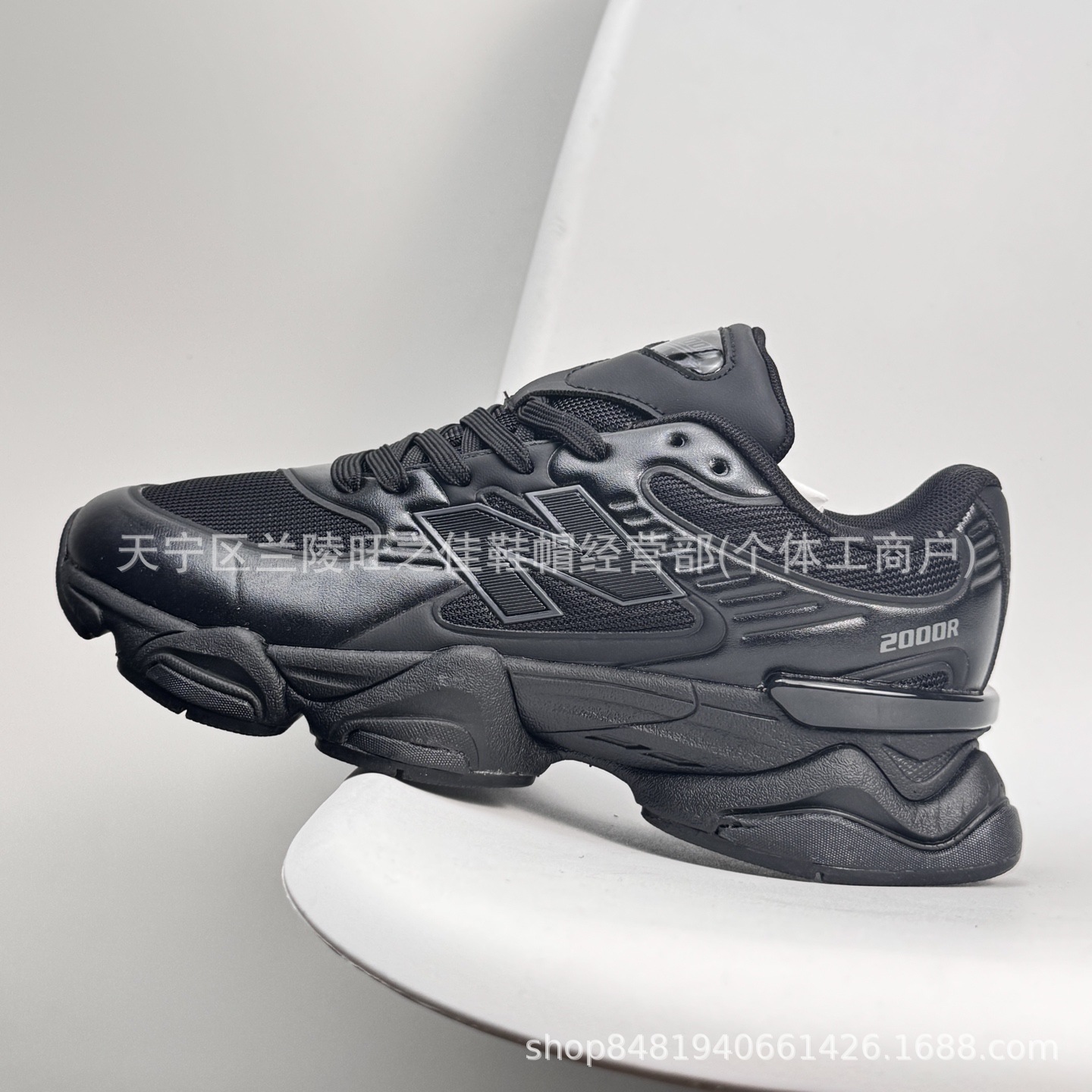 Putian NB M2000 serie de moda versátil tela de cuero artificial de cerdo amortiguador antideslizante desgaste zapatillas de correr bajas