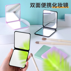 Portable folding handheld mirror, small dressing mirror for women to carry with them, student dormitory desktop, small gift wholesale