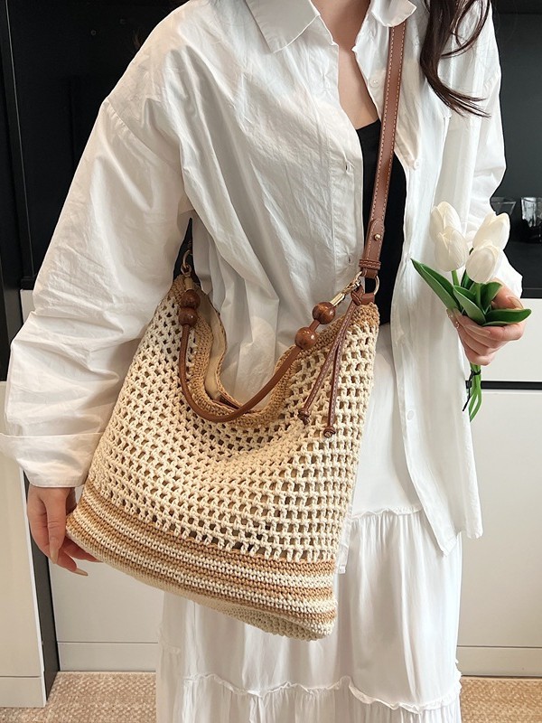 Vacaciones en la playa nuevas bolsas de mujer 2026 moda hueco trenzado bolsa de playa de viaje simple bolsa tote mochila image 1