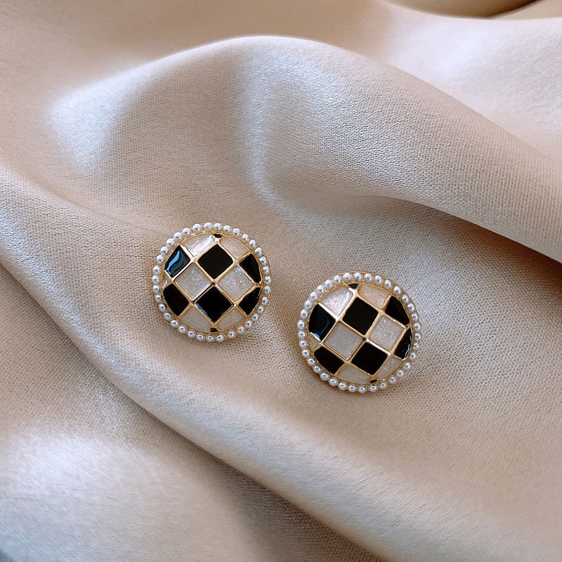 Aguja de plata de moda alta sensación de diamante de goteo de aceite pendientes nicho universal elegante pernos de orejas ligero lujoso temperamento simple orejas para mujeres