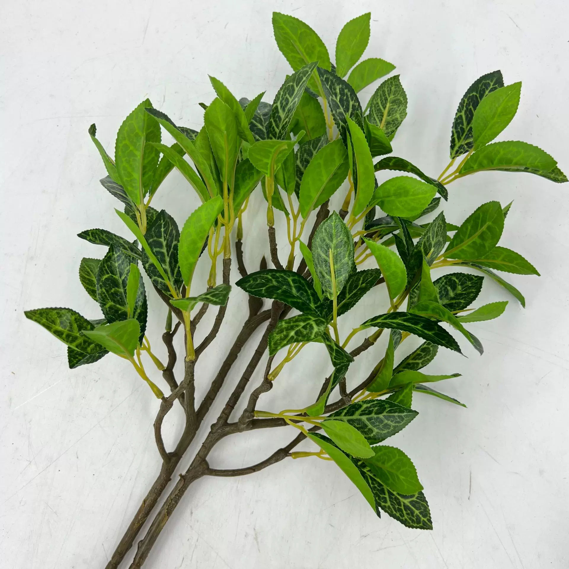 批发仿真绿植跨境热卖单枝瑞香叶酒店园林商场布景婚礼餐厅装饰